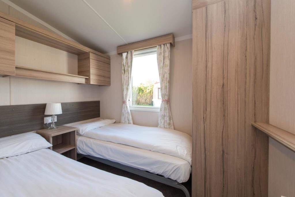 Bedroom Cupboards Wrapped In Wood Grain Finish In Kent UK 