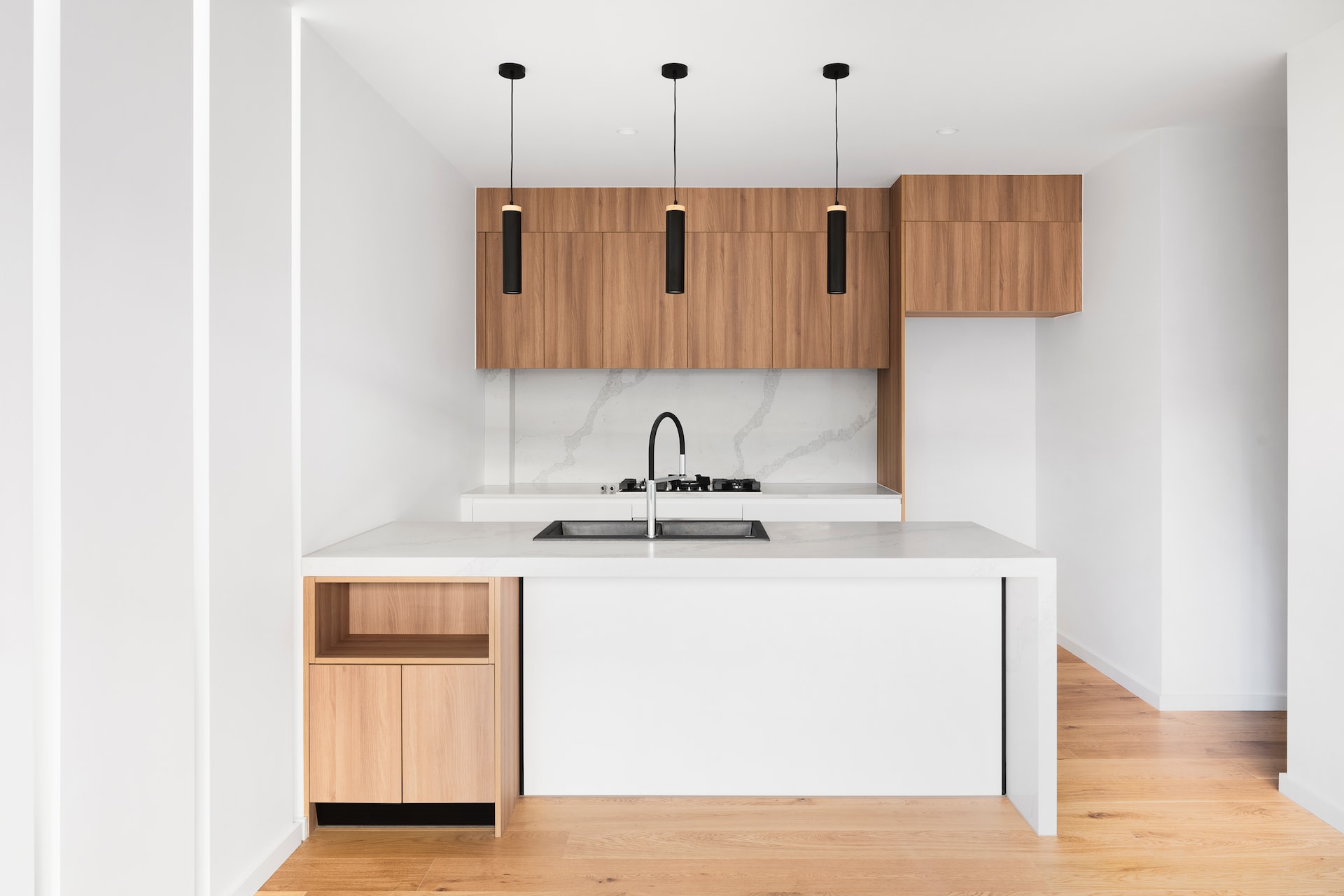https://universalkitchenwraps.co.uk/wp-content/uploads/2023/01/small-white-kitchen-vinyl-wrapped-with-wood-finish-in-coventry.jpg